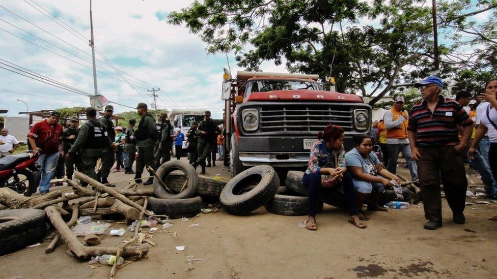 Protesters block road linking Venezuela and Brazil