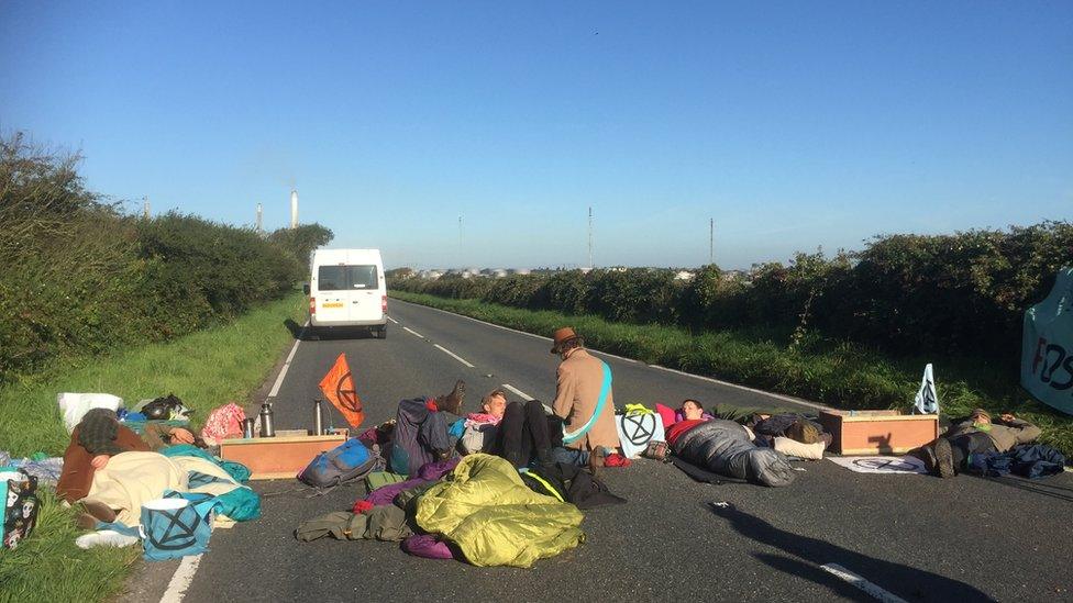 Protesters lying in the road