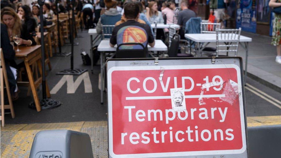 Coronavirus warning sign in Old Compton Street, London