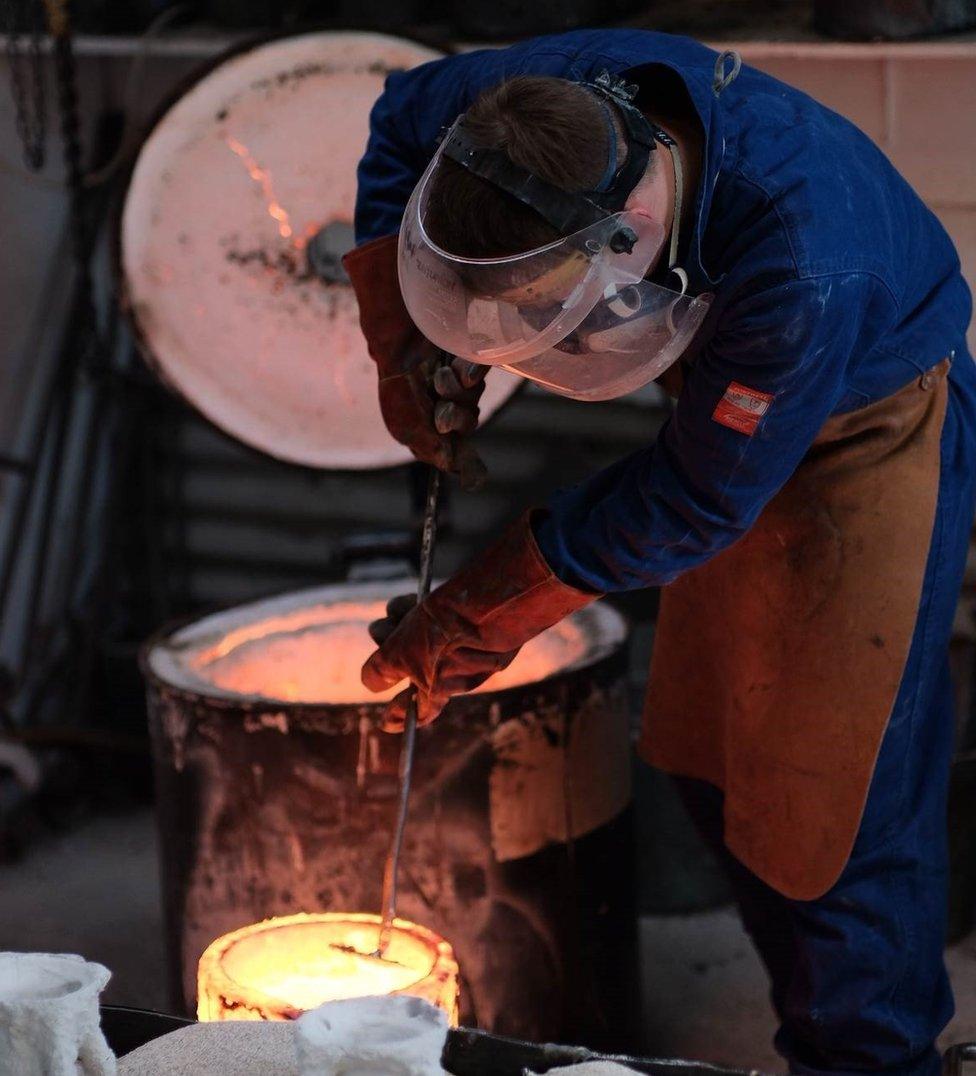 Bronze sculpture being cast