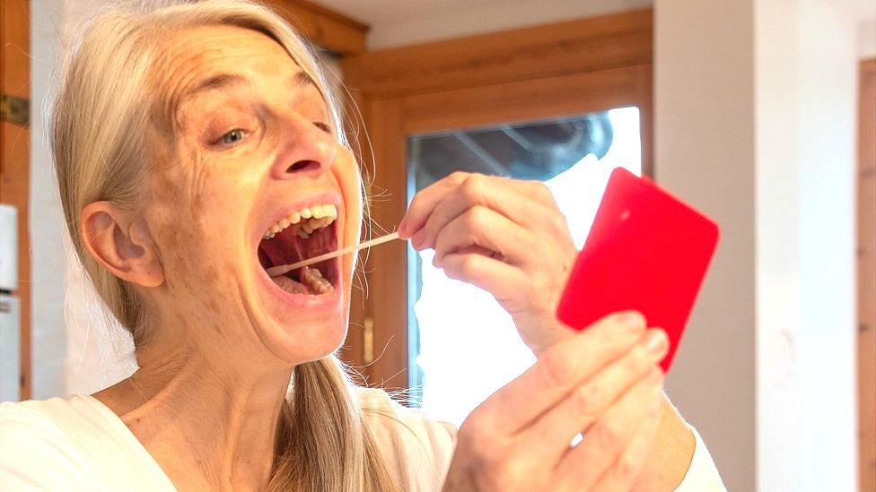 woman doing a Covid test