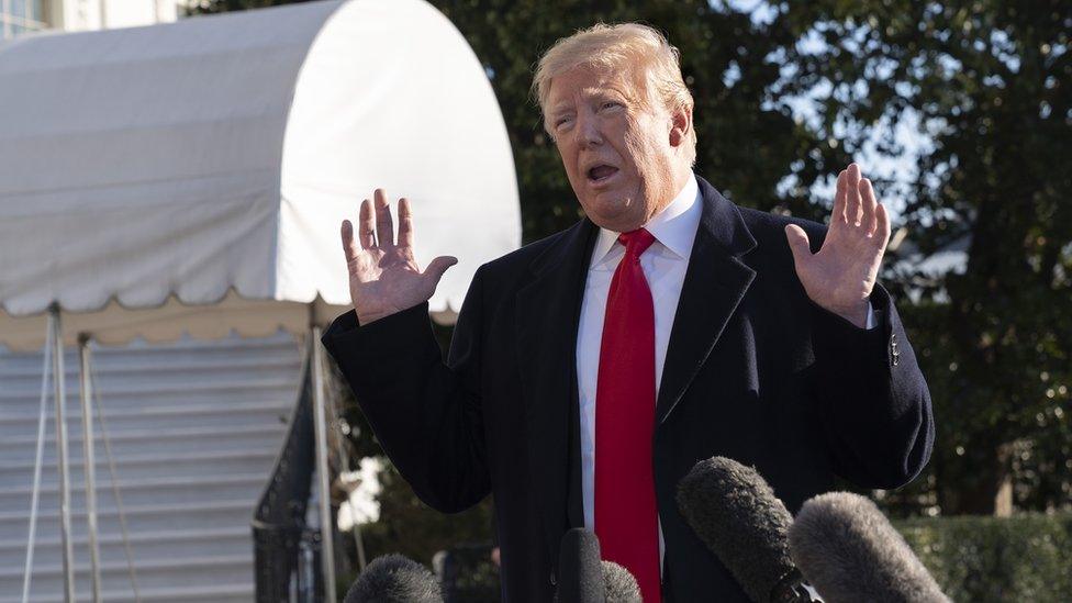 U.S. President Donald Trump speaks to the media before departing the White House for Camp David on January 6, 2019 in Washington, DC