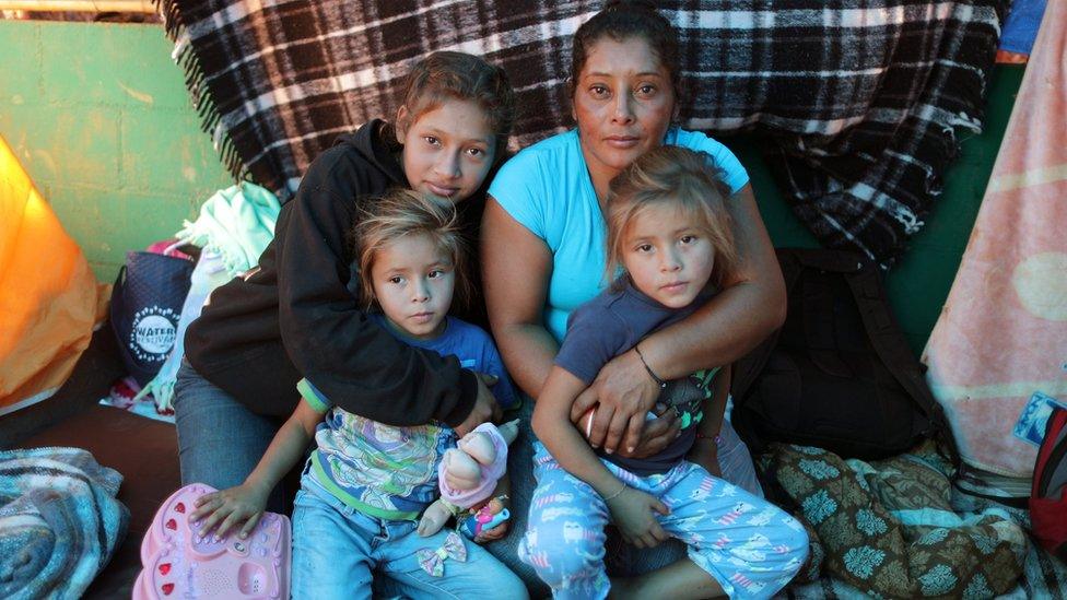 Maria Meza with her three daughters