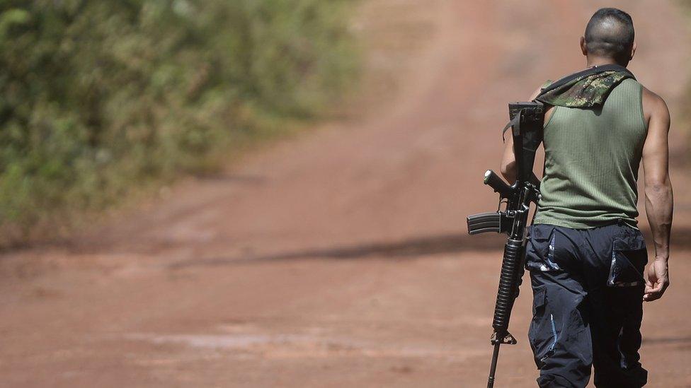 Farc rebel with gun