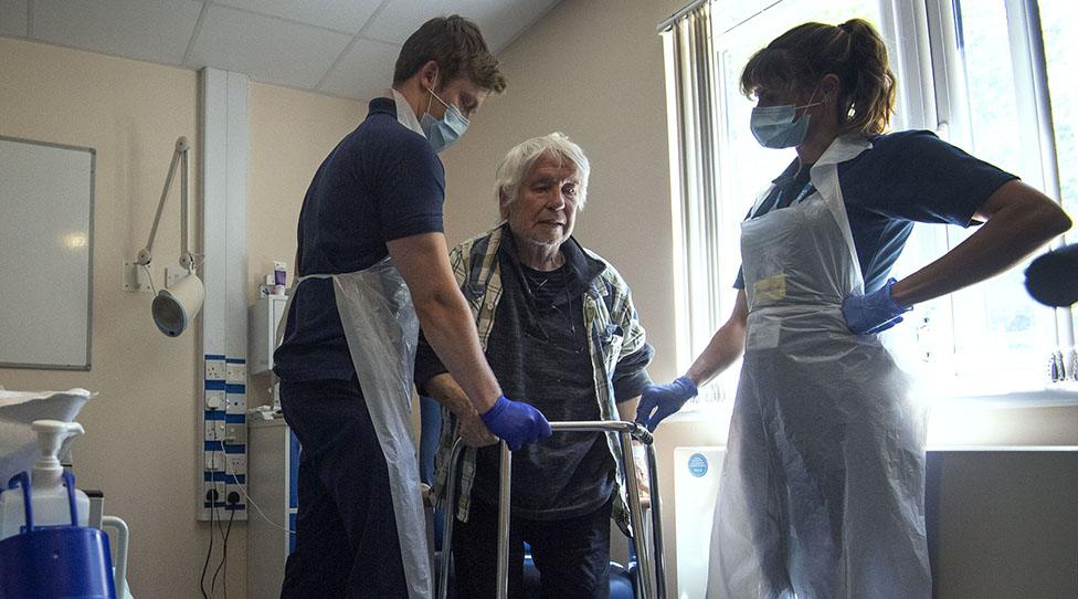 Hospital staff carry out physiotherapy