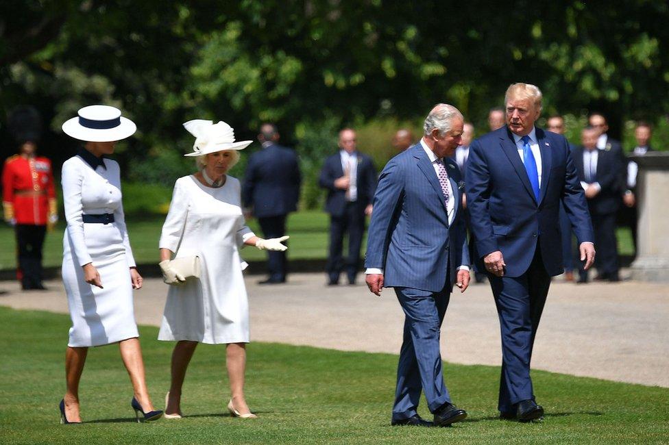 Camilla, Duchess of Cornwall (second left) and Prince Charles, Prince of Wales (second right) greet President Trump and his wife