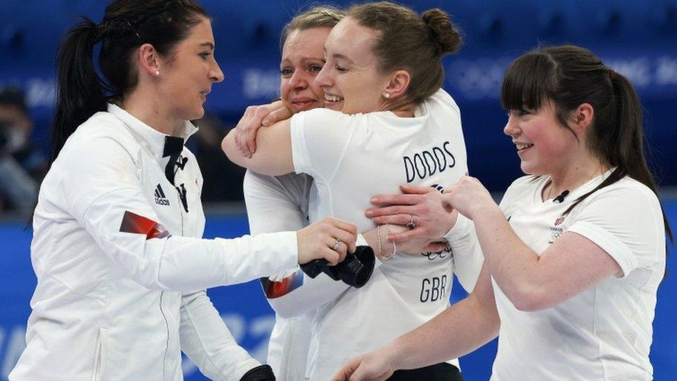 Team GB women's curling team celebrating their victory