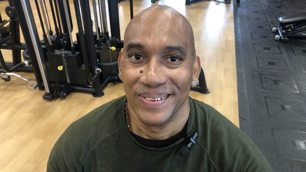 Ian Barrington, in the gym - looking to the camera and smiling