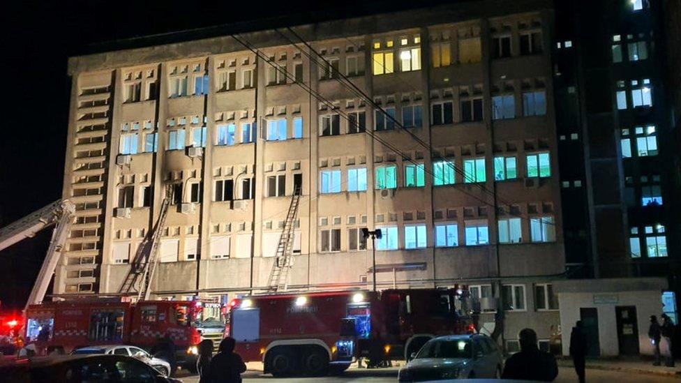 The emergency services at the scene of a hospital fire where the intensive care unit was burned in Piatra Neamt, Romania, 14 November 2020