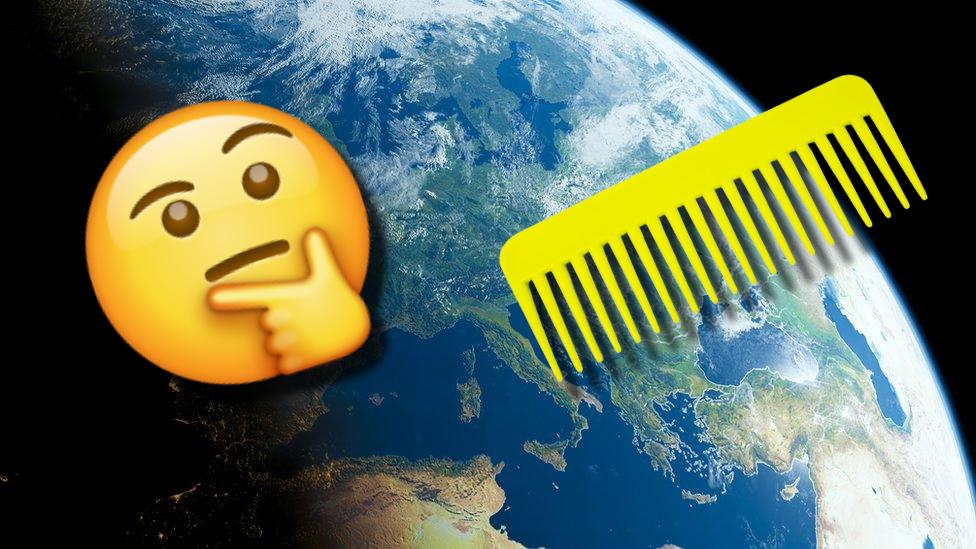 Planet Earth from space with a floating comb and thinkng face emoji