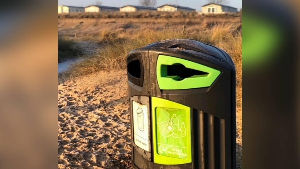 Bin on a beach