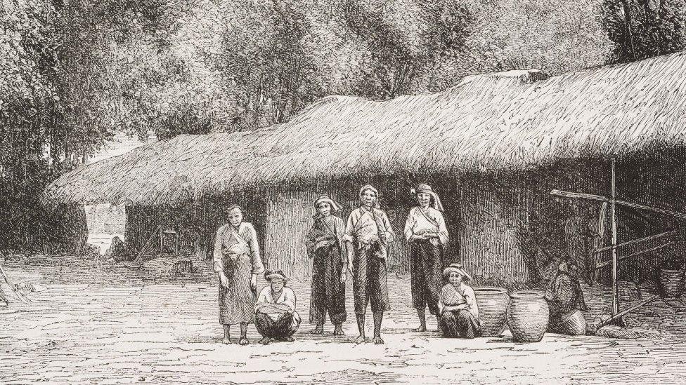 line drawing of a group of taiwanese people outside a hut with a grass roof and trees in the background