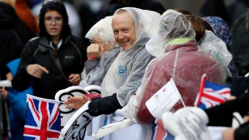 man in poncho