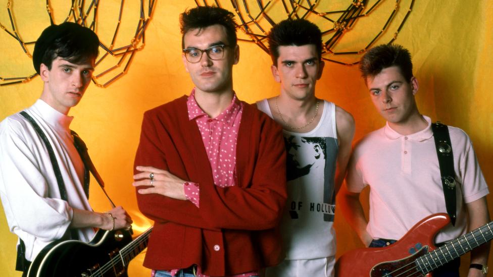 Bassist Andy Rourke poses with other members of The Smiths, for a portrait ahead of their first show in Detroit during the 1985 Meat Is Murder Tour