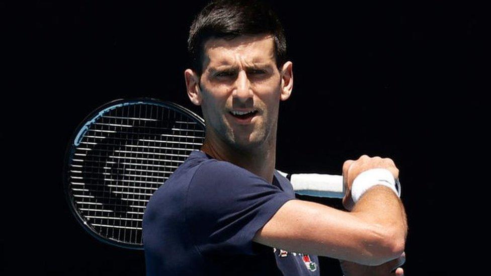 Novak Djokovic of Serbia plays a forehand shot during a practice session ahead of the 2022 Australian Open at Melbourne Park on January 12, 2022 in Melbourne, Australia.