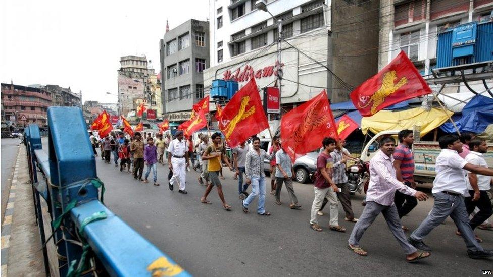 Communist Party trade union activists march during a 24 hour general strike in Calcutta, India, 02 September 2015.