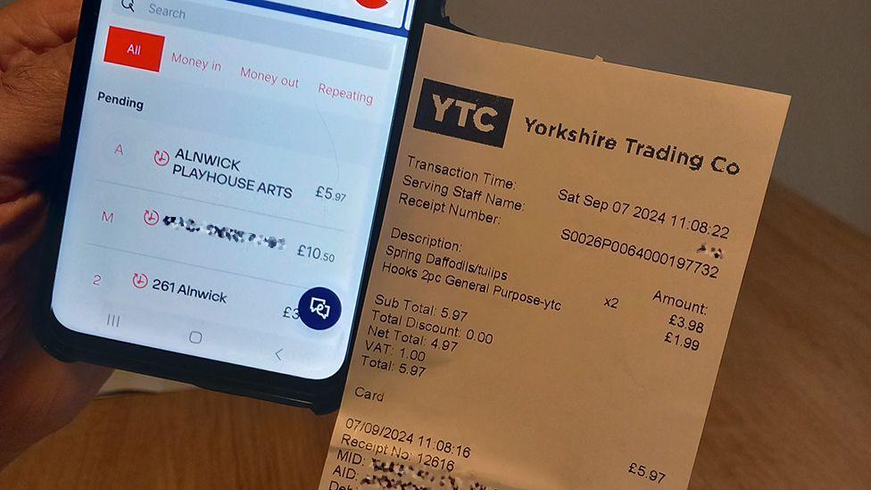 A receipt and banking app side by side showing a transaction for the same amount - £5.97 - but the app showing Alnwick Playhouse Arts and the receipt showing Yorkshire Trading Company