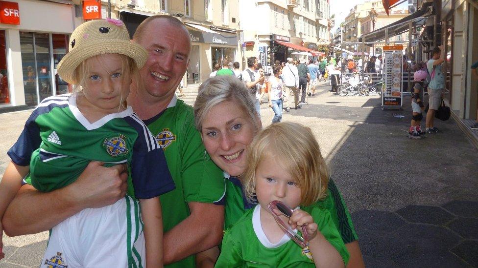 Catherine McComb with her husband and their two daughters