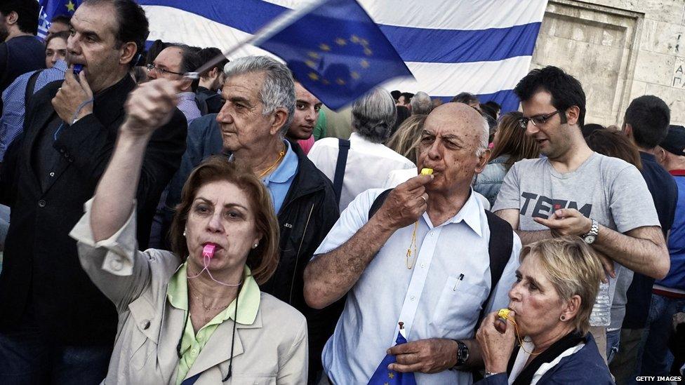 Pro-Euro protesters take part in a rally in front of the Parliament on June 22. 2015 in Athens, Greece.