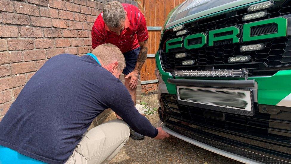 Gary showing his car to Jonathan Vernon-Smith