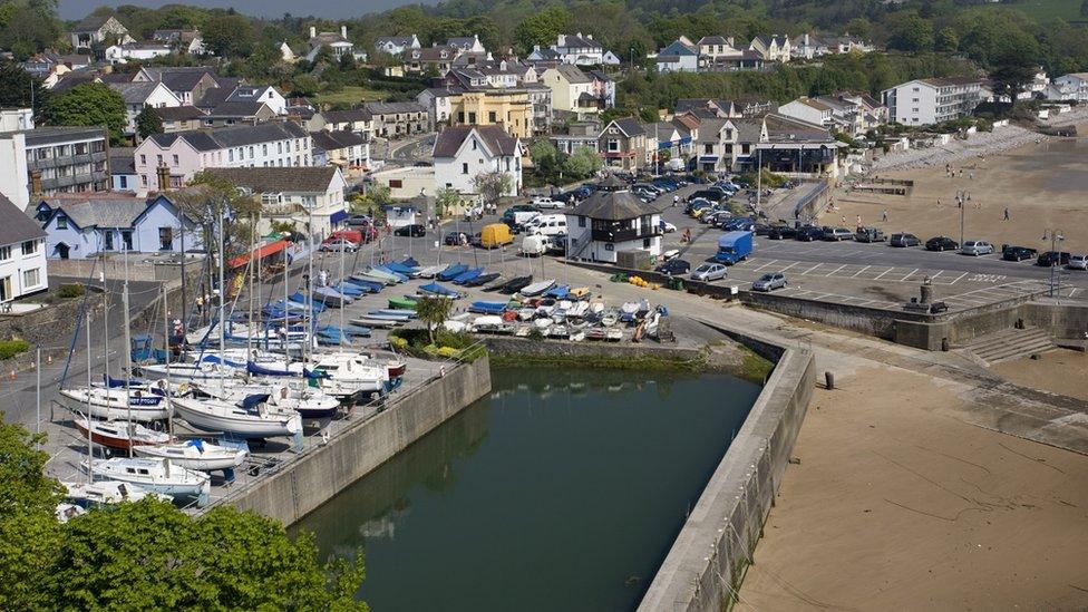 A view of Saundersfoot town, harbour and beach