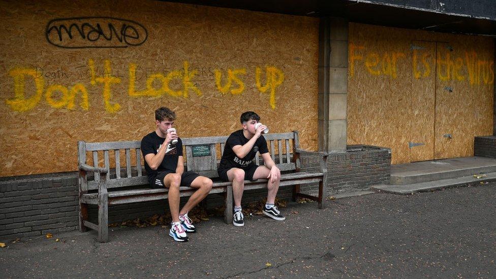 Boarded up shop