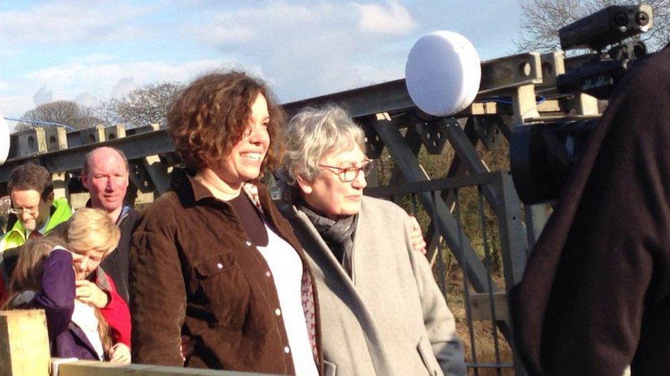 Local residents walking over the footbridge for the first time