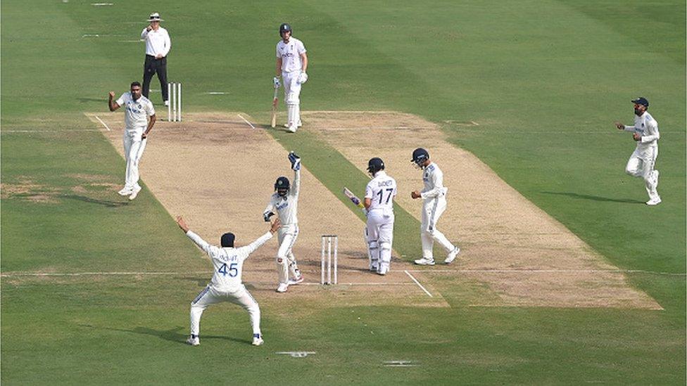 India bowler Ravi Ashwin celebrates after taking the wicket of England batsman Ben Duckett during day one of the 1st Test Match between India and England at Rajiv Gandhi International Stadium on January 25, 2024 in Hyderabad, India.