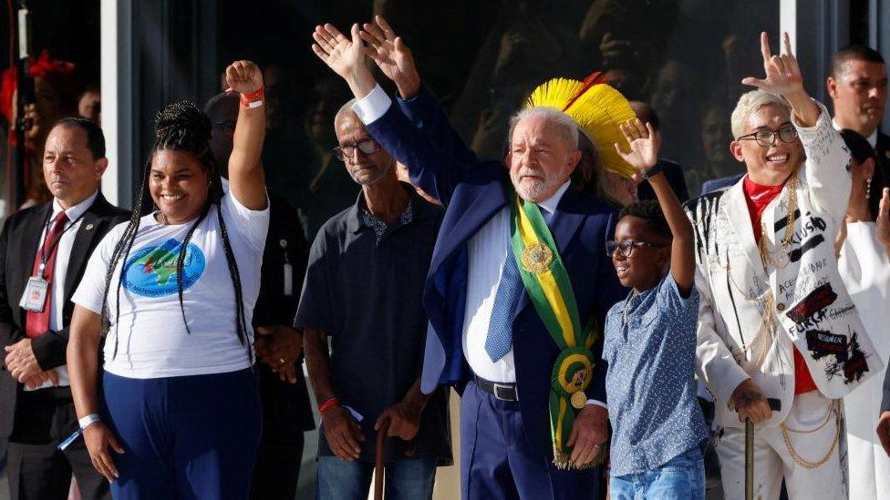 Brazil's President Luiz Inacio Lula da Silva gestures after receiving the presidential sash at the Planalto Palace, in Brasilia, Brazil, January 1, 2023.