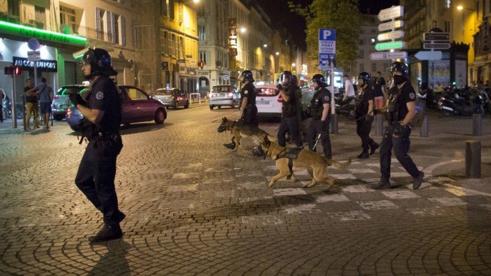 Police on patrol with dogs in France