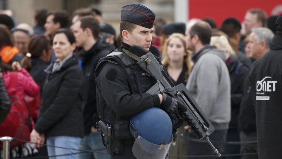 Policeman outside Louvre museum - 17 November