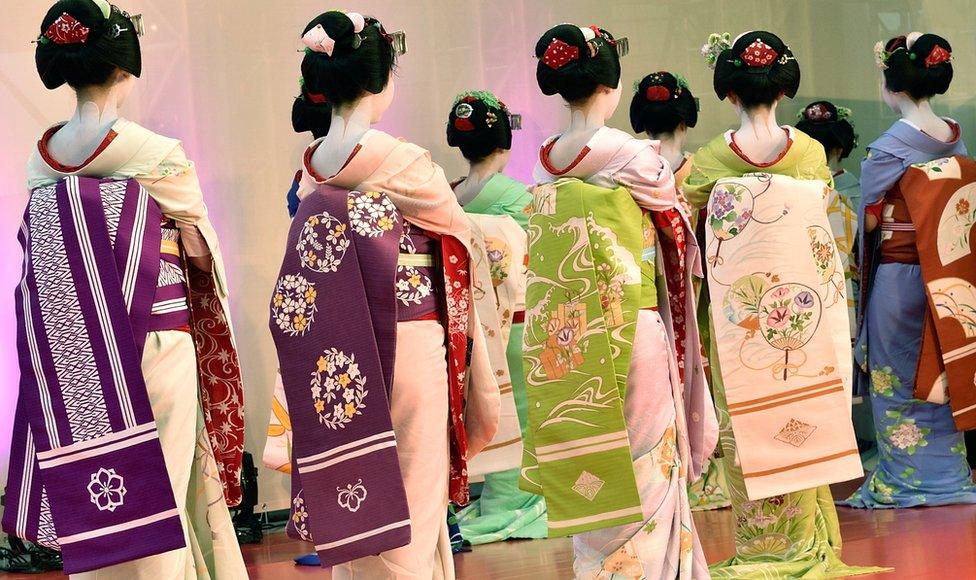 Woman wearing kimonos