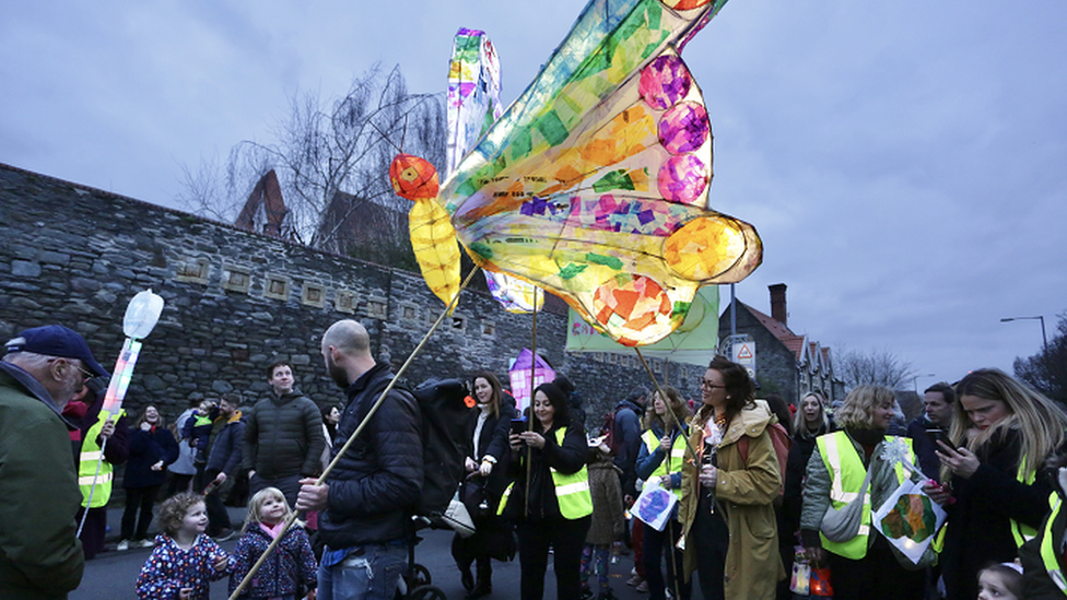 Huge colourful butterfly taking part in Bedminster Winter Lantern Parade