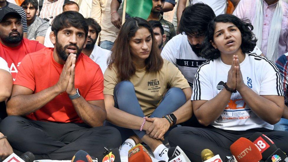 Wrestlers Bajrang Punia, Vinesh Phogat, Sakshi Malik, and others address a press conference during their protest against the Wrestling Federation of India at Jantar Mantar, on April 23, 2023 in New Delhi, India.