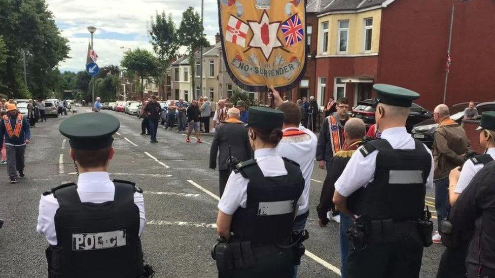 Members of the three lodges involved in the Ardoyne parade dispute arrived at police lines led by the Ballysillan banner in 2016