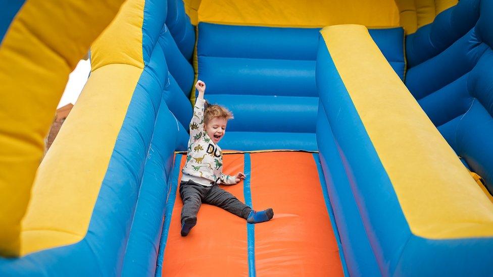 Child on bouncy castle