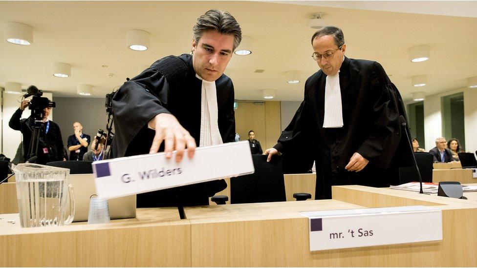 The lawyers of Dutch anti-Islam MP Geert, Maarten 't Sas (L) and Geert-Jan Knoops arrive at the courthouse in Schiphol, Badhoevedorp,(31 Oct)