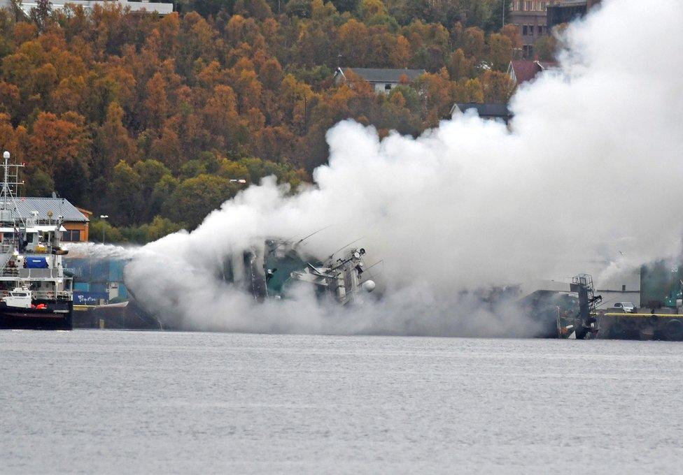 The Russian fishing trawler Bukhta Nayezdnik sinks in Breivika harbour of Tromso, northern Norway, 26 September 2019.