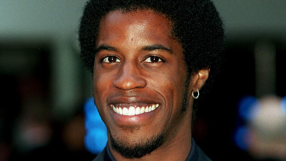 Ahmed Best pictured smiling in 1999, the year Star Wars: Episode I - The Phantom Menace was released