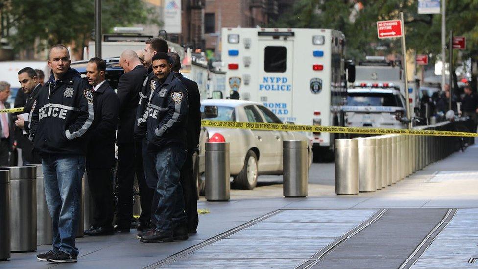 Police gather outside the Time Warner building in New York City