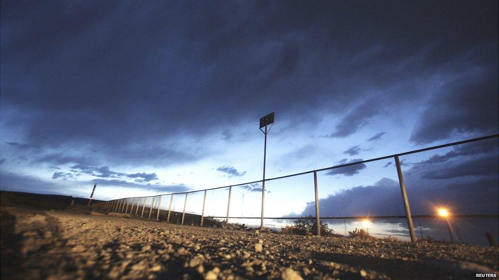 The fence marking the border between Mexico and the US is seen in the Anapra neighbourhood of Ciudad Juarez - 23 May 2014