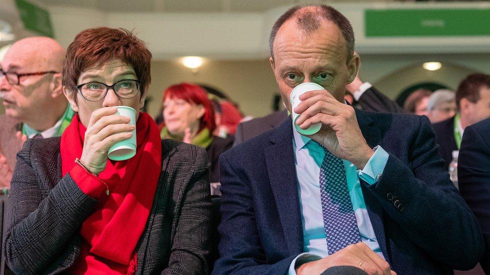 Annegret Kramp-Karrenbauer (L) and Friedrich Merz (R)