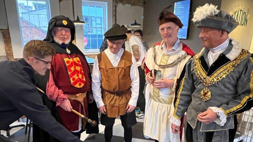 Andrew Fisher, Gloucester town crier Alan Myatt, ale conner Jim Jenkins and Paul James City Guardian and sheriff councillor Justin Hudson