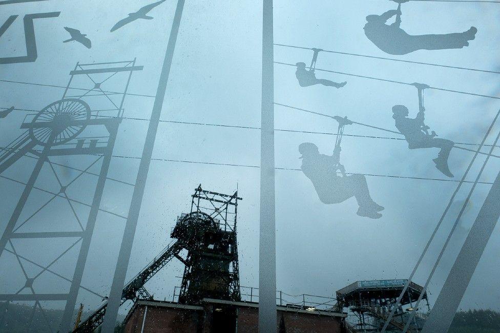 Zip World Tower with the old pit head winding gear seen through the window