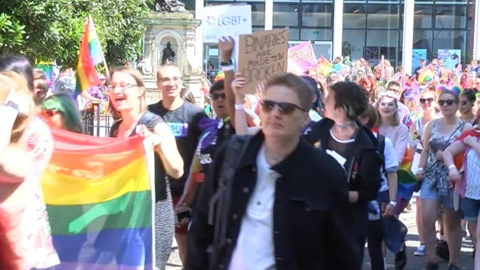 People taking part in the Pride parade