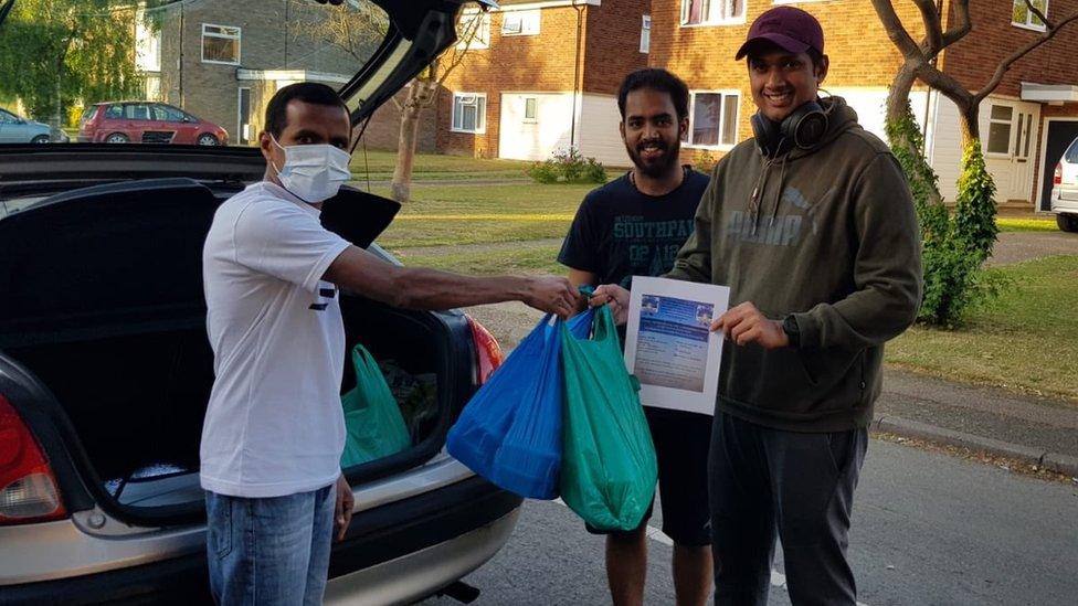 Food being handed over to students