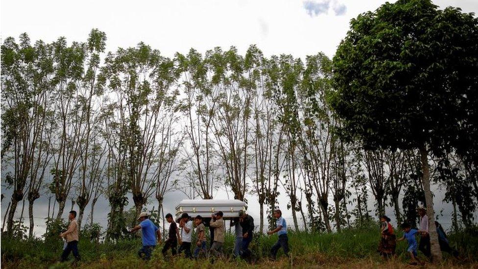 Friends and family carry a coffin with the remains of Jakelin Caal, a 7-year-old girl Guatemalan girl who died after she and her father were detained by U.S. border agents, during her funeral in her home village of San Antonio Secortez, Guatemala December 25, 2018.