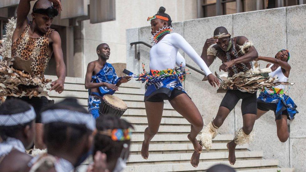 Dance group performing during a protest