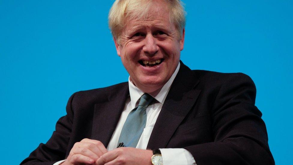 A smiling Boris Johnson