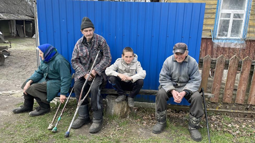 Adults from left: Lidiya Bilousova, Anatoliy Bilousova and Mykhaylo Dudko